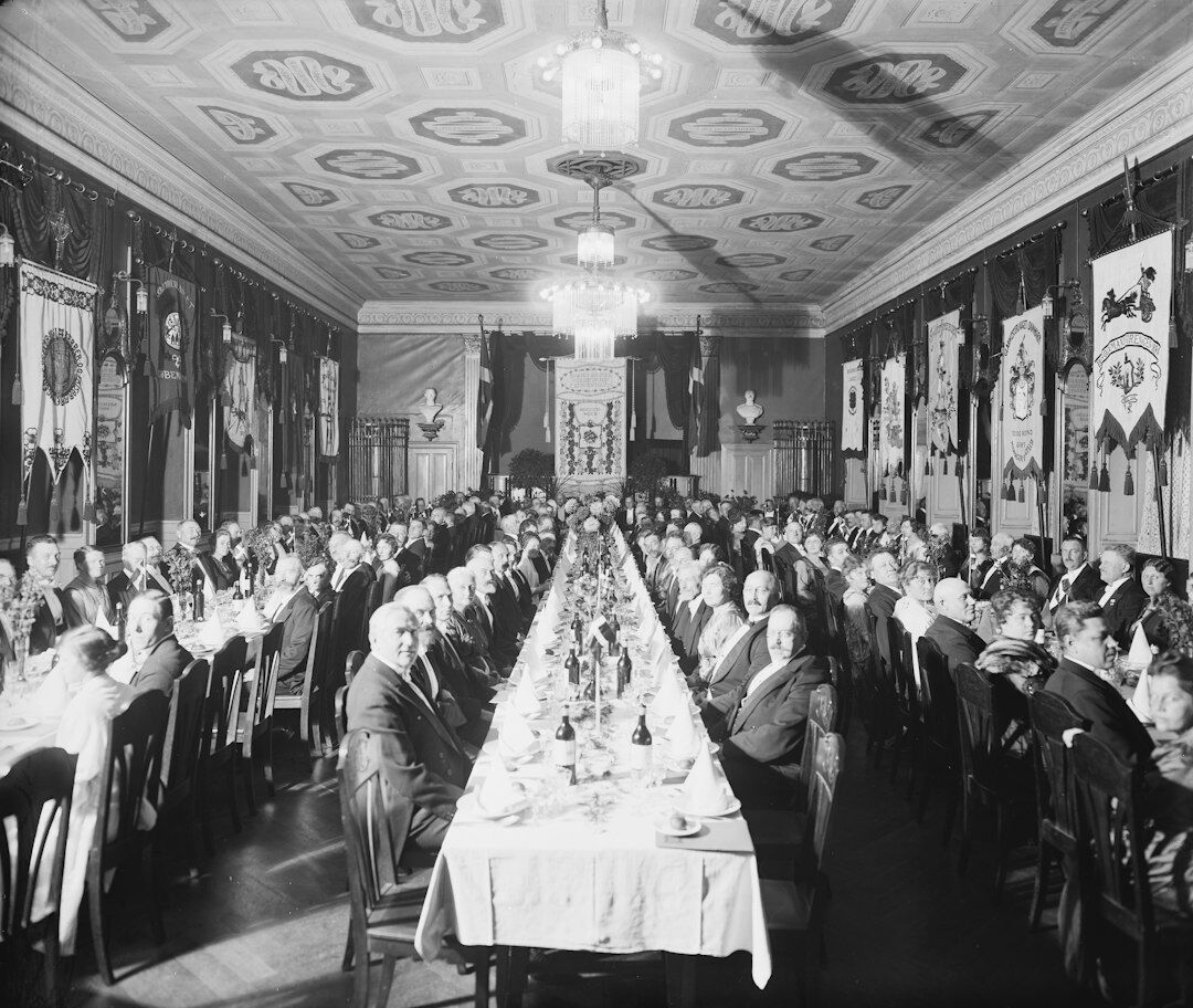 Danish family gathered around a dinner table sharing a meal