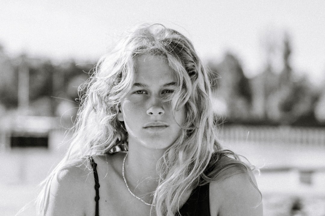 Portrait of a smiling young Danish woman in casual clothing